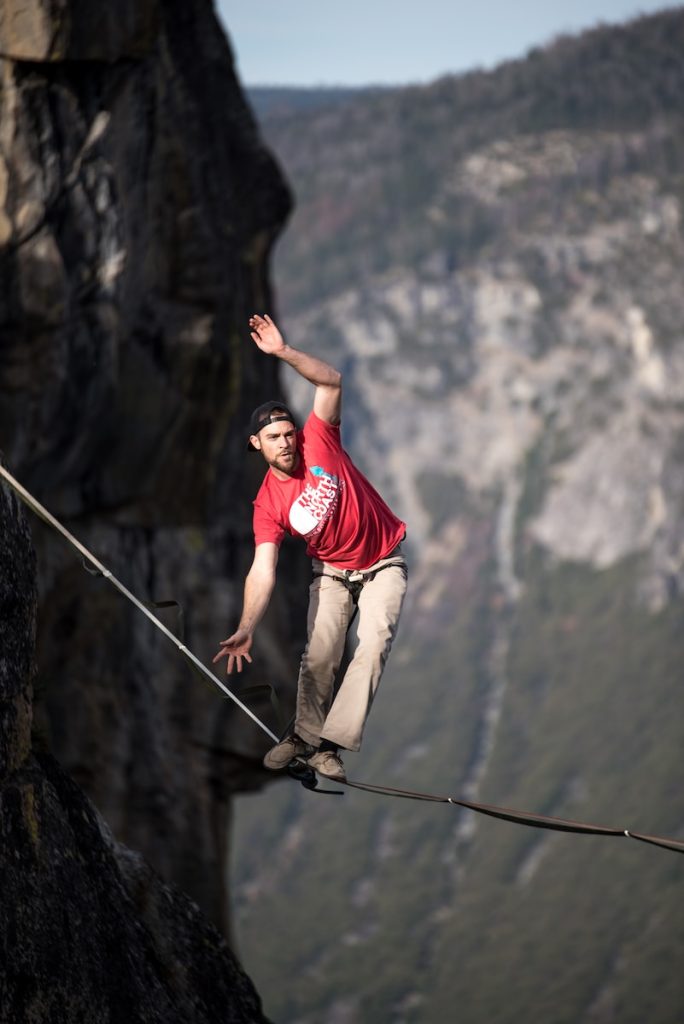 man balance rope